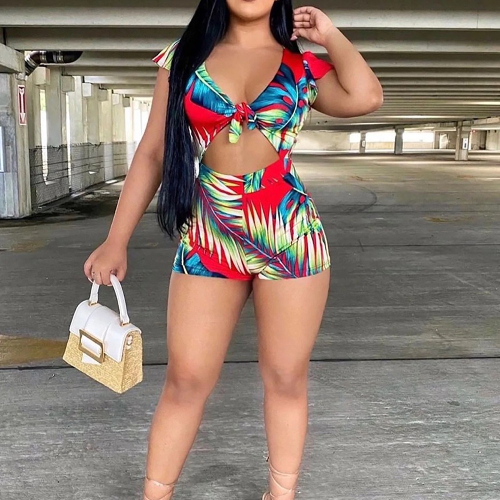 One piece open stomach romper from Fashion Nova